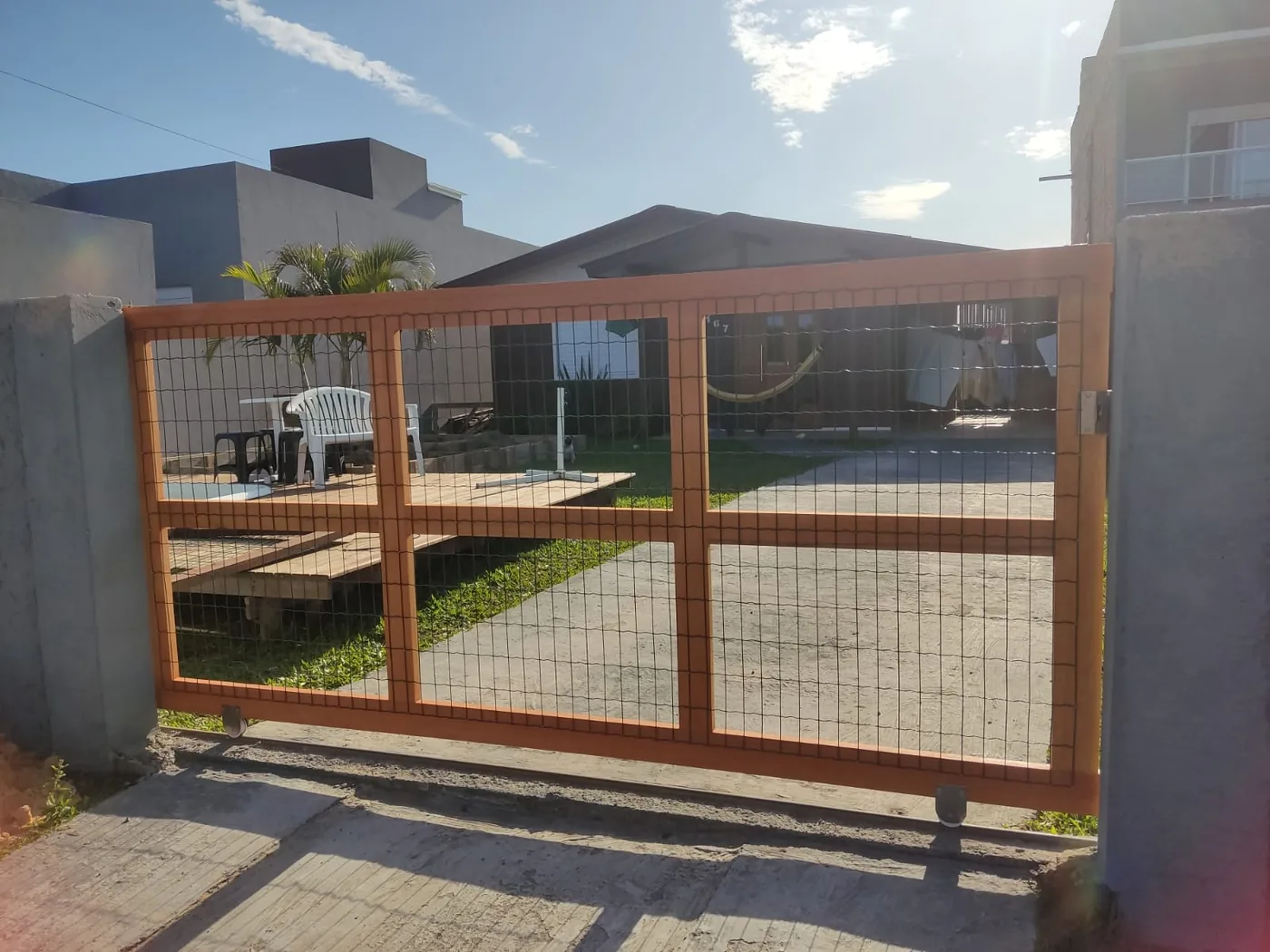 Portão de madeira fabricado pela Elite Portões